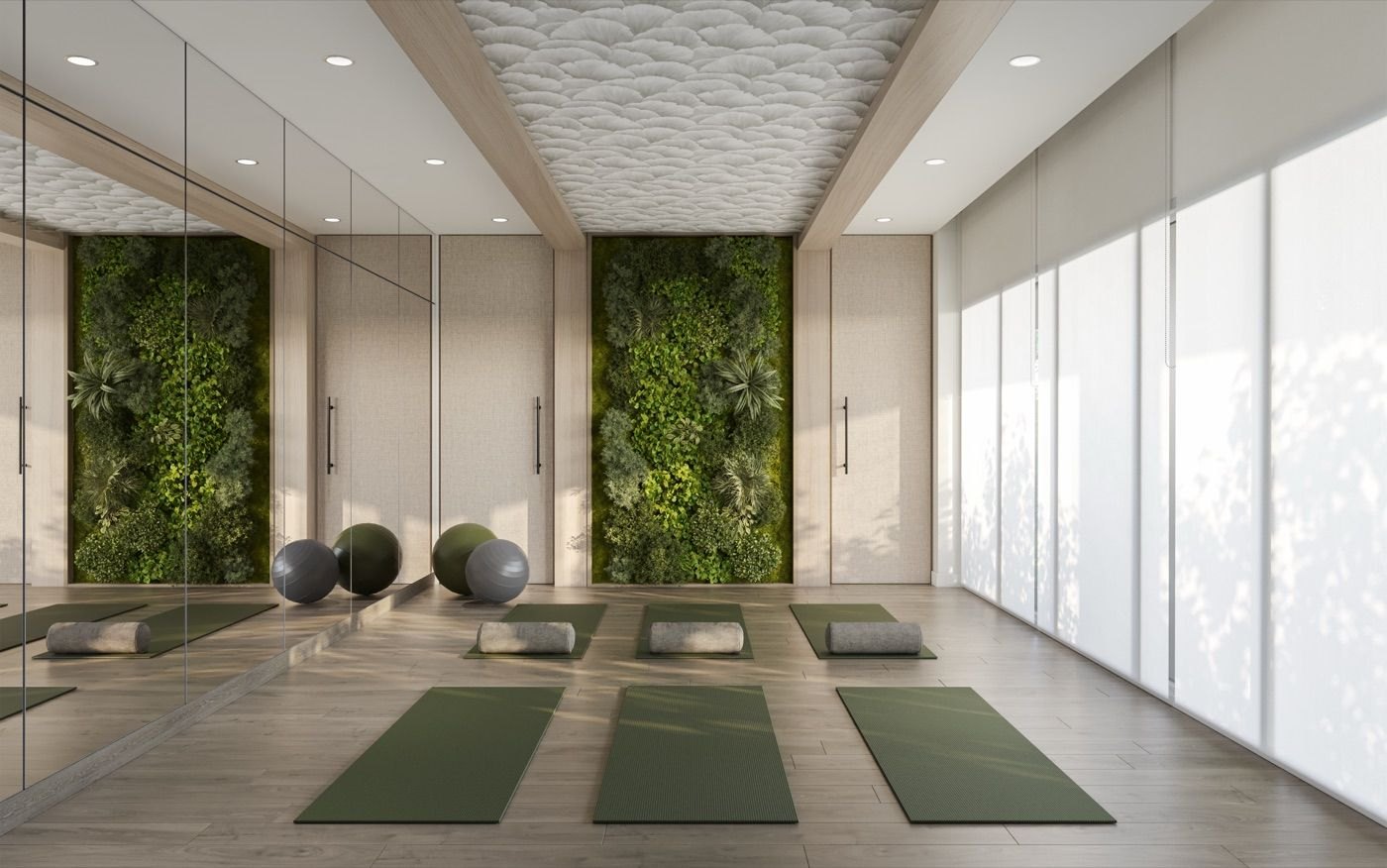 NORTHCORE yoga studio rendering with a living moss wall, mirrors and mats